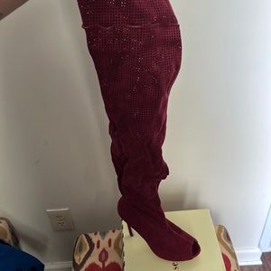 Thigh high peep toe boot